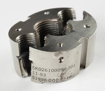 Lot #404 STS-103 Flown Propellant Line Shear Frangible Nut: Frangible nut used on the Space Shuttle Discovery during STS-103 - Image 1