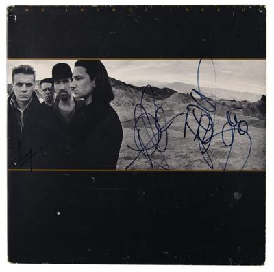 Lot #2309 U2 Signed Album - Image 1