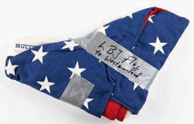 Lot #25 Lyndon B. Johnson: President Johnson extends a Capitol-flown flag to the commander of American forces in Vietnam?