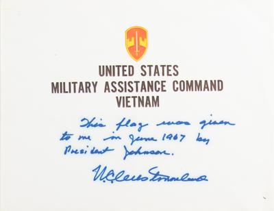 Lot #25 Lyndon B. Johnson: President Johnson extends a Capitol-flown flag to the commander of American forces in Vietnam?