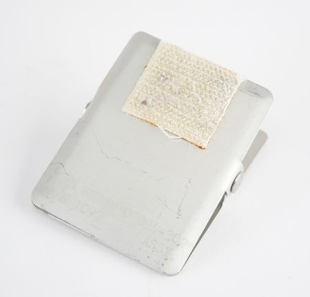 Lot #7328 Charles Conrad's Apollo 12 Flown Data File Clip - Image 1