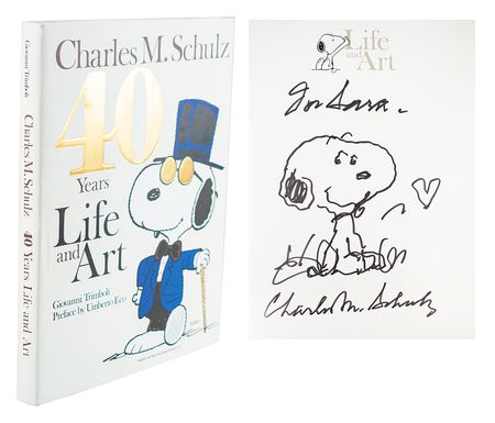 Lot #425 Charles Schulz Signed Book with Snoopy Sketch - Image 1