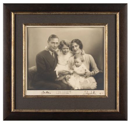 Lot #132 Queen Elizabeth II, King George VI, and Elizabeth, Queen Mother: Remarkable family photo signed by the 5-year-old 