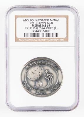 Lot #80 Charlie Duke's Apollo 14 Flown Robbins Medallion - Image 1