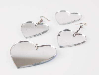 Lot #8071 Prince's Stage-Worn Mirrored Heart Earrings (4) from the LoveSexy Tour - Image 1