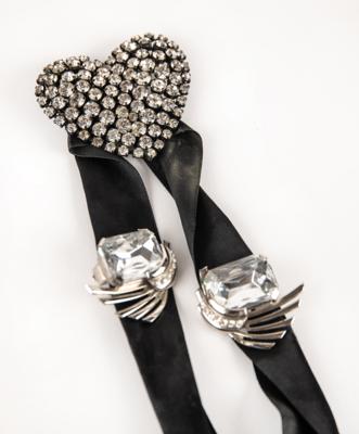 Lot #8036 Prince: (3) Screen-Worn Brooches from 'Kiss' Music Video - Image 1