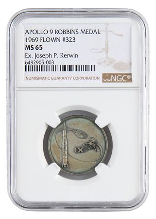 Lot #9223 Joe Kerwin's Apollo 9 Flown Robbins Medallion - Image 1