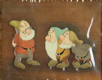 Lot #690 Doc, Bashful, and Sneezy production cel from Snow White and the Seven Dwarfs - Image 1