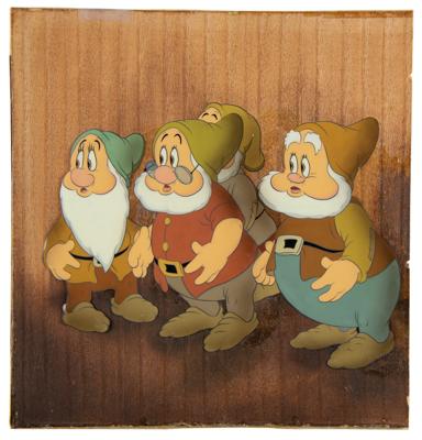 Lot #691 Bashful, Doc, Sneezy, and Happy production cel from Snow White and the Seven Dwarfs - Image 1