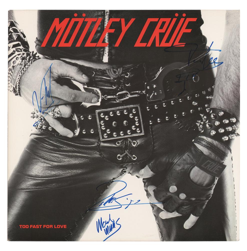 Motley Crue Signed Album | RR Auction
