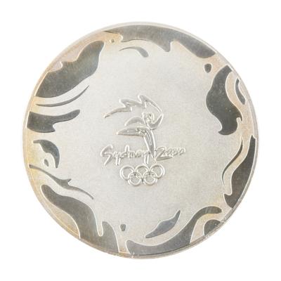 Lot #4156 Sydney 2000 Summer Olympics Silver-colored Participation Medal - Image 1