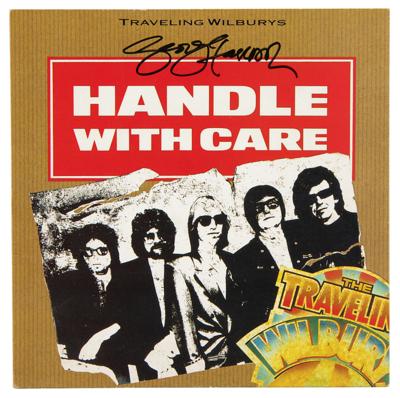 Lot #524 Beatles: George Harrison Signed Traveling Wilburys 45 RPM Record - Image 1