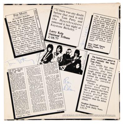 Lot #602 Tom Petty and the Heartbreakers Signed Album - Official Live ?Leg - Image 1