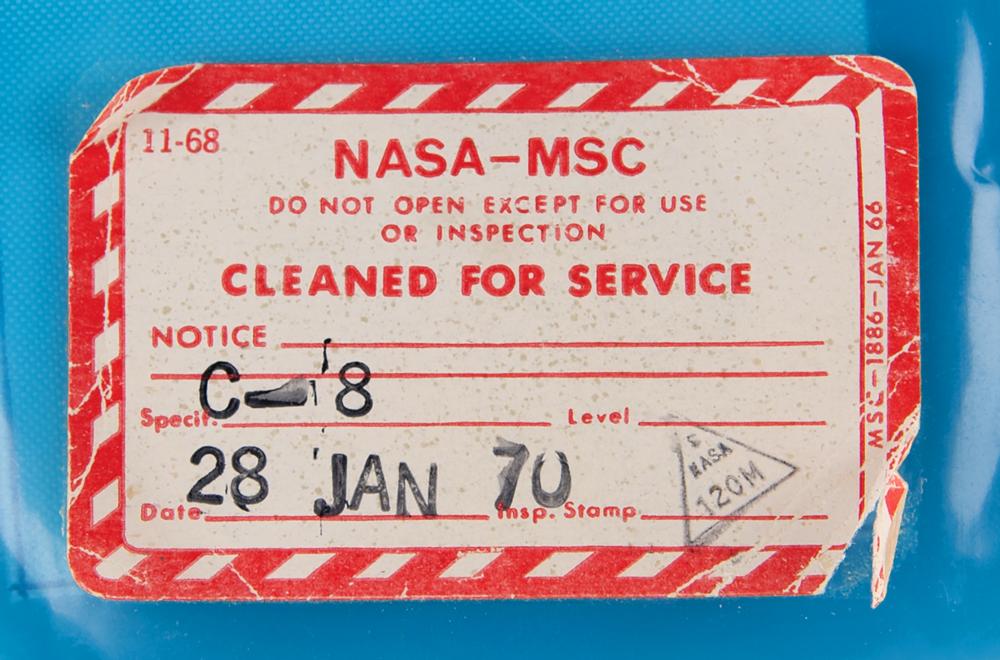 Neil Armstrong Flight-Spare Name Tag with NASA Pouch | RR Auction