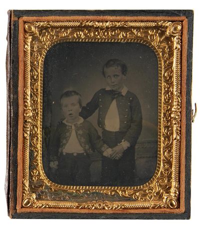 Lot #309 Union Soldier's Children Tintype Carried in War: Tintype of two children carried by their father 