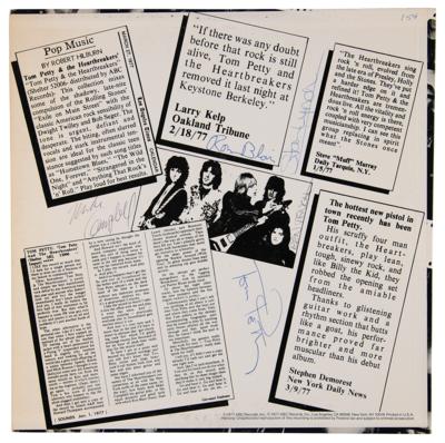 Lot #9156 Tom Petty and the Heartbreakers Signed Promotional Album - Official Live ‘Leg - Image 1