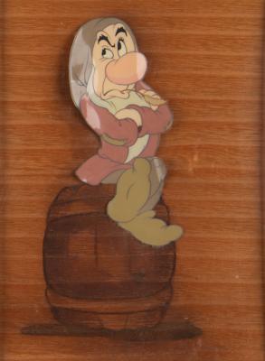Lot #390 Grumpy production cel from Snow White and the Seven Dwarfs (Walt Disney Studios, 1937) - Image 1