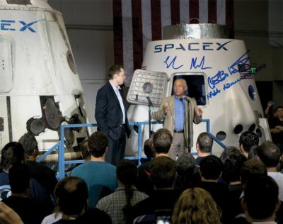 Lot #144. Elon Musk and Charles Bolden Signed Photograph