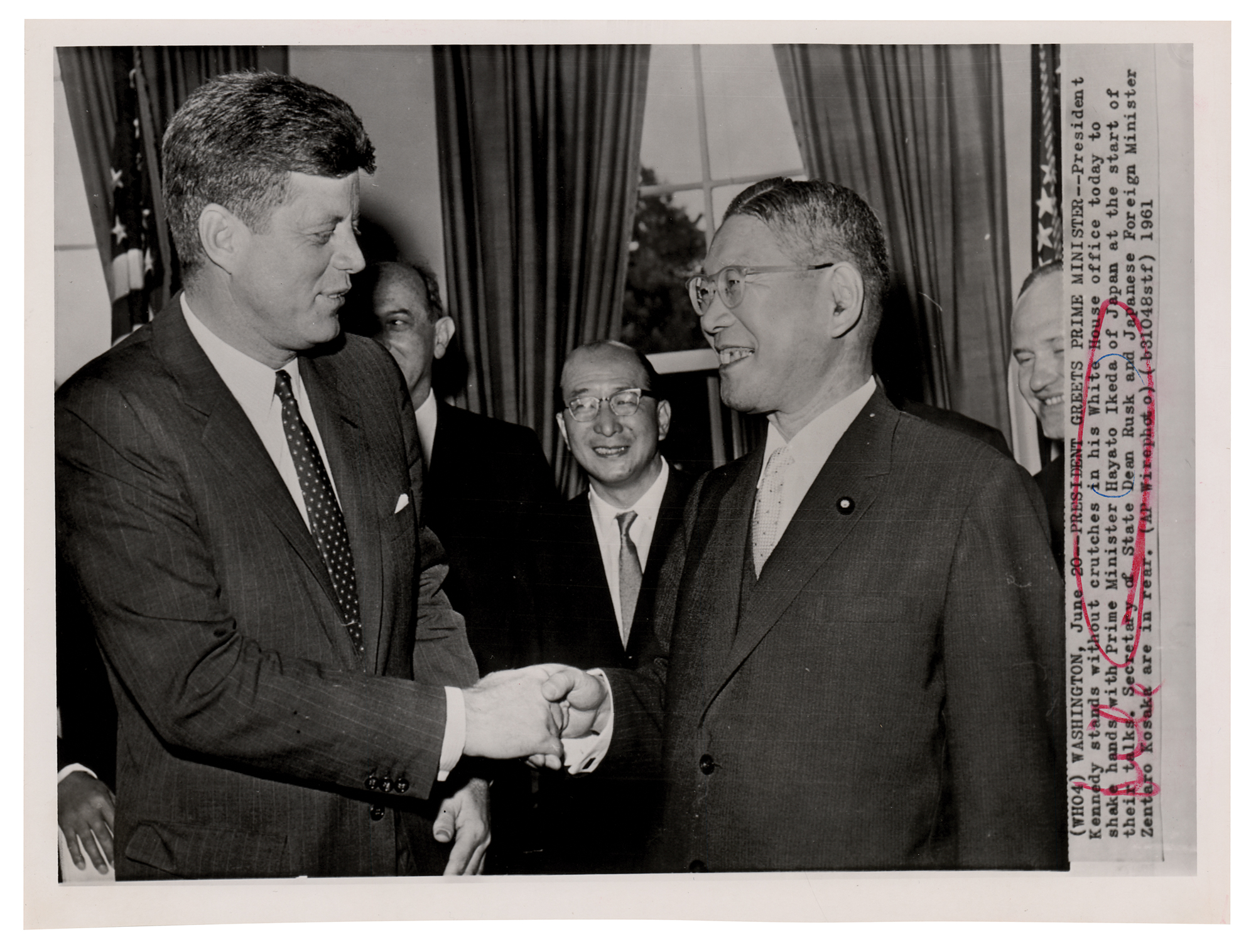 John F. Kennedy and Hayato Ikeda Original Wirephoto | RR Auction