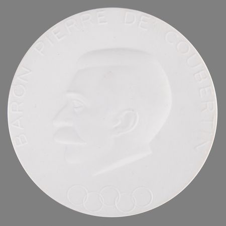 Lot #3355 Munich 1972 Summer Olympics 'Pierre de Coubertin' Porcelain Medallion by Meissen - Image 1