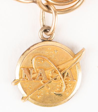 Lot #6004 Jo Schirra's Mercury-Apollo Charm Bracelet including (4) Flown Charms, with Rare Gold Apollo 7 Robbins Medallion - Image 4