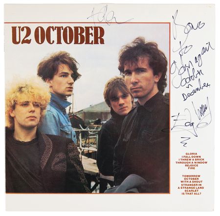 Lot #7318 U2 Signed Album - October - Image 1