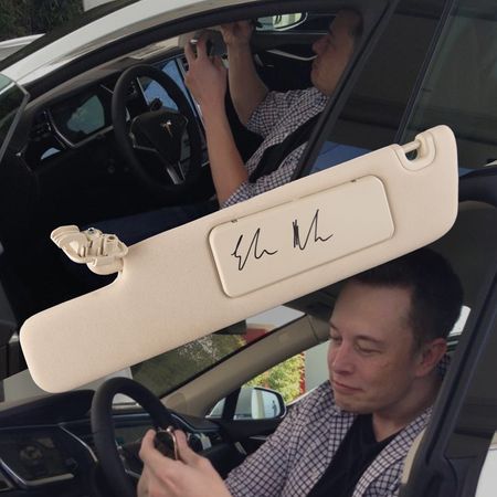 Lot #133. Elon Musk Signed Tesla Model S Sun Visor