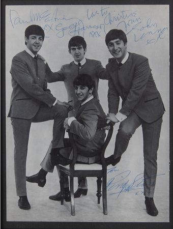 Lot #4042 Beatles Signed 1963 Program Page - Dezo Hoffman's Classic 'Collarless Suits' Portrait - Image 1