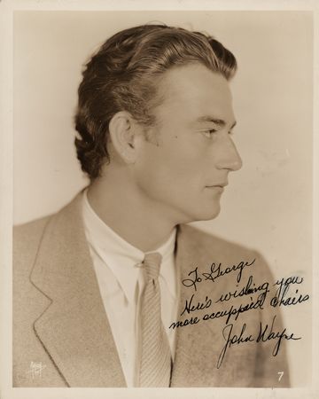 Lot #701 John Wayne Signed Photograph - Early 'Fox Films' Actor Portrait - Image 1