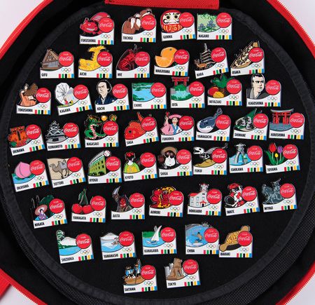 Lot #3255 Tokyo 2020 Summer Olympics 'Team Coca-Cola' Torch Relay Pin Set - Image 1