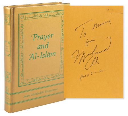 Lot #900 Muhammad Ali Signed Book - Prayer and Al-Islam - Image 1