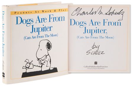 Lot #620 Charles Schulz Signed Book - Dogs Are From Jupiter (Cats Are From The Moon) - Image 1
