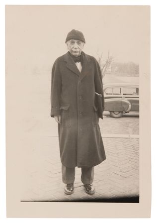 Lot #4109 Albert Einstein Original Photograph - Standing in Winter Coat - Image 1