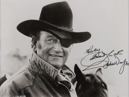 Lot #475 John Wayne Signed Photograph as Rooster Cogburn from True Grit - Image 1