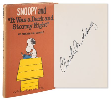 Lot #419 Charles Schulz Signed Book - Snoopy and 'It Was a Dark and Stormy Night' - Image 1