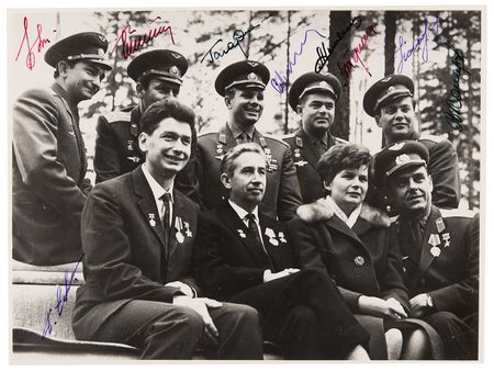 Lot #372 Cosmonauts (9) Signed Photograph with Gagarin, Komarov, and Tereshkova - Image 1