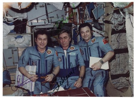 Lot #395 Soyuz TM-3 Signed Photograph - Image 1