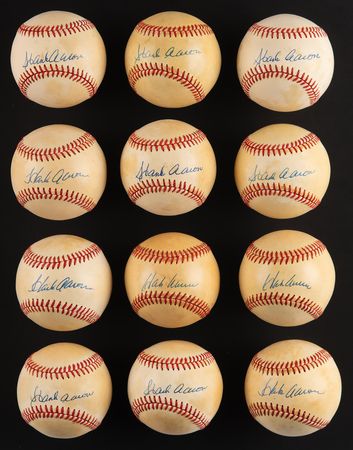 Lot #861 Hank Aaron (12) Signed Baseballs