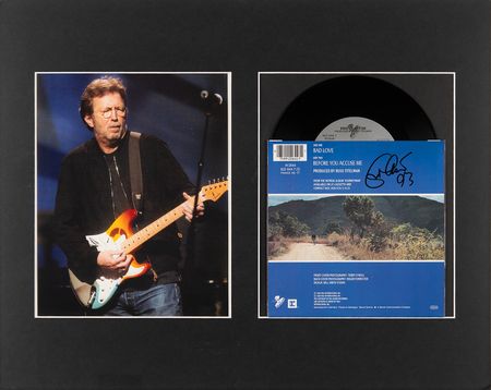 Lot #680 Eric Clapton Signed 45 RPM Record - 'Bad Love / Before You Accuse Me' - Image 1