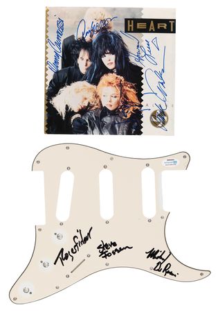 Lot #694 Heart (2) Signed Items - Pickguard and 45 RPM Record - Image 1
