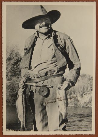 Lot #585 Ernest Hemingway Signed 'Fishing' Photograph - Quintessential Uninscribed Portrait - Image 1