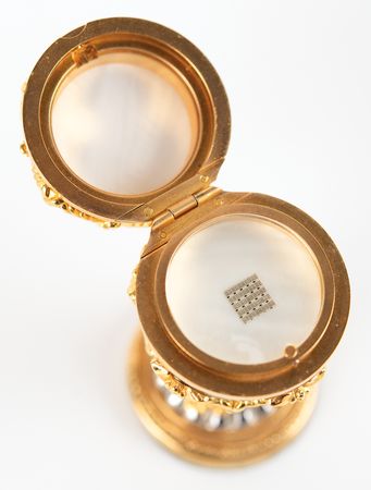 Lot #7283 Apollo 14 Lunar Surface-Flown Lunar Bible Text Fragment in Fabergé Egg - From the Personal Collection of Edgar Mitchell - Image 1