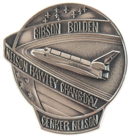 Lot #7463 ST-61-C Flown Robbins Medallion - Image 1