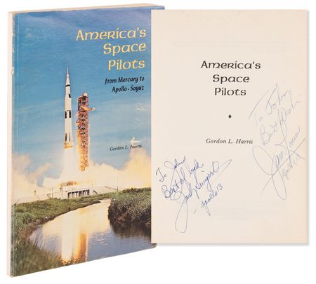Lot #7264 Jack Swigert and Jim Lovell Signed Book - America's Space Pilots - Image 1