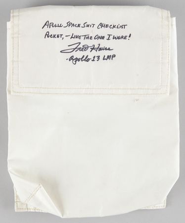 Lot #7244 Fred Haise Signed Apollo A7L Space Suit Checklist Pocket - Image 1
