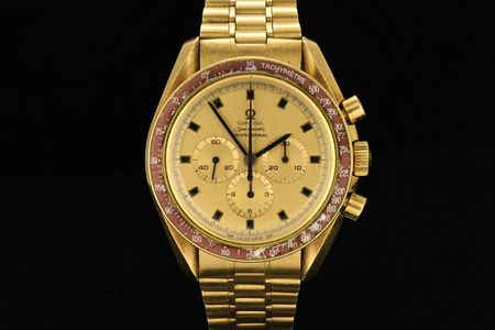 Lot #7000 Neil Armstrong's Omega Speedmaster Professional 18K Gold 1969 Apollo 11 Commemorative Watch - Image 1