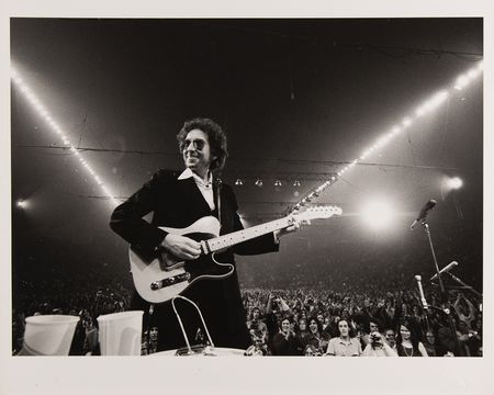 Lot #9155 Bob Dylan Oversized Photograph by Barry Feinstein - 'Smile on Stage, LA Forum, 1974' - Image 1