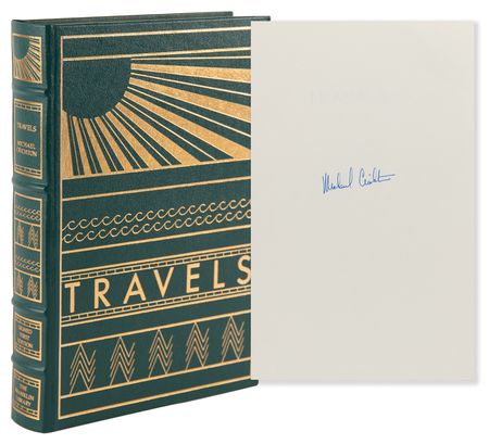 Lot #721 Michael Crichton Signed Book - Travels - Image 1