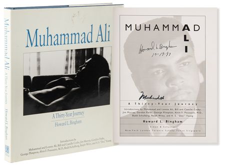 Lot #948 Muhammad Ali Signed Book - A Thirty Year Journey - Image 1