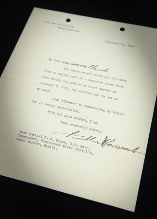 Lot #409 President Franklin D. Roosevelt Accepts a Birthday Gift Paperweight ?made from an engine part of a Japanese plane shot down during the attack on Pearl Harbor on December 7, 1941? - Image 1